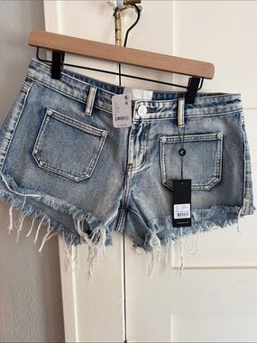 Free People Faded Blue Distressed Denim Cutoff Shorts